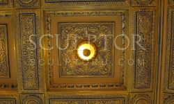 Gilded moldings on the ceiling